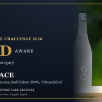 Promotional key visual announcing TSUNAN SAKE BREWERY's GO TERRACE Junmai Daiginjo winning Gold at the Tokyo Sake Challenge 2026, with a gold award medal and the GO TERRACE bottle on a navy background.